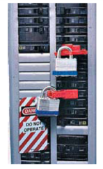 Danger tagged circuit breaker locking off devices.