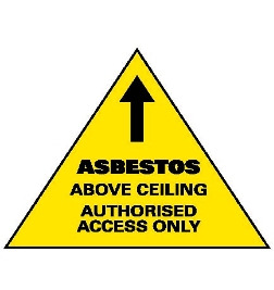 Sign says;
ASBESTOS
Above ceiling
Authorised access only.