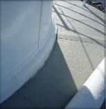 Photograph showing grey balcony floor