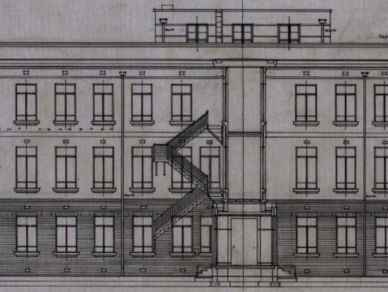 Sketch of part of a three-storey building with an external staircase.