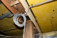 Timber post and beams in a ceiling space.