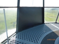 Photograph showing cast iron lattice floor wrapped around the inside of the lantern room with glazing panes above.