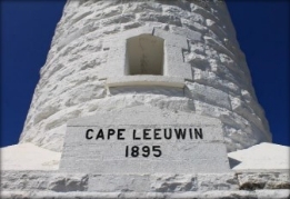 Photograph showing white stone tower with inscription which reads "Cape Leeuwin 1895".