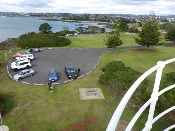 Photograph of carpark from above, taken from balcony. 