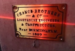 Photograph of Chance Brothers plaque which reads "Chance Brothers & Co. Lighthouse Engineers & Constructors Near Birmingham 1889". 