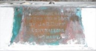 Photograph showing plaque which reads "This Lighthouse was erected in the year 1889 by J & R Duff, Contractors, Hobart".