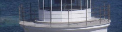 Photograph showing balcony at top of lighthouse tower. 