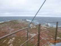 Photograph showing view of ocean from lighthouse balcony. 