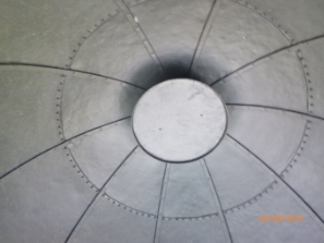 Photograph showing  underside of dome roof, comprised of galvanised sheets screwed together.