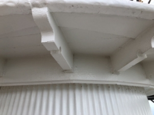 Photograph showing underside of the lighthouse's timber balcony floor with hardwood joist supports. 